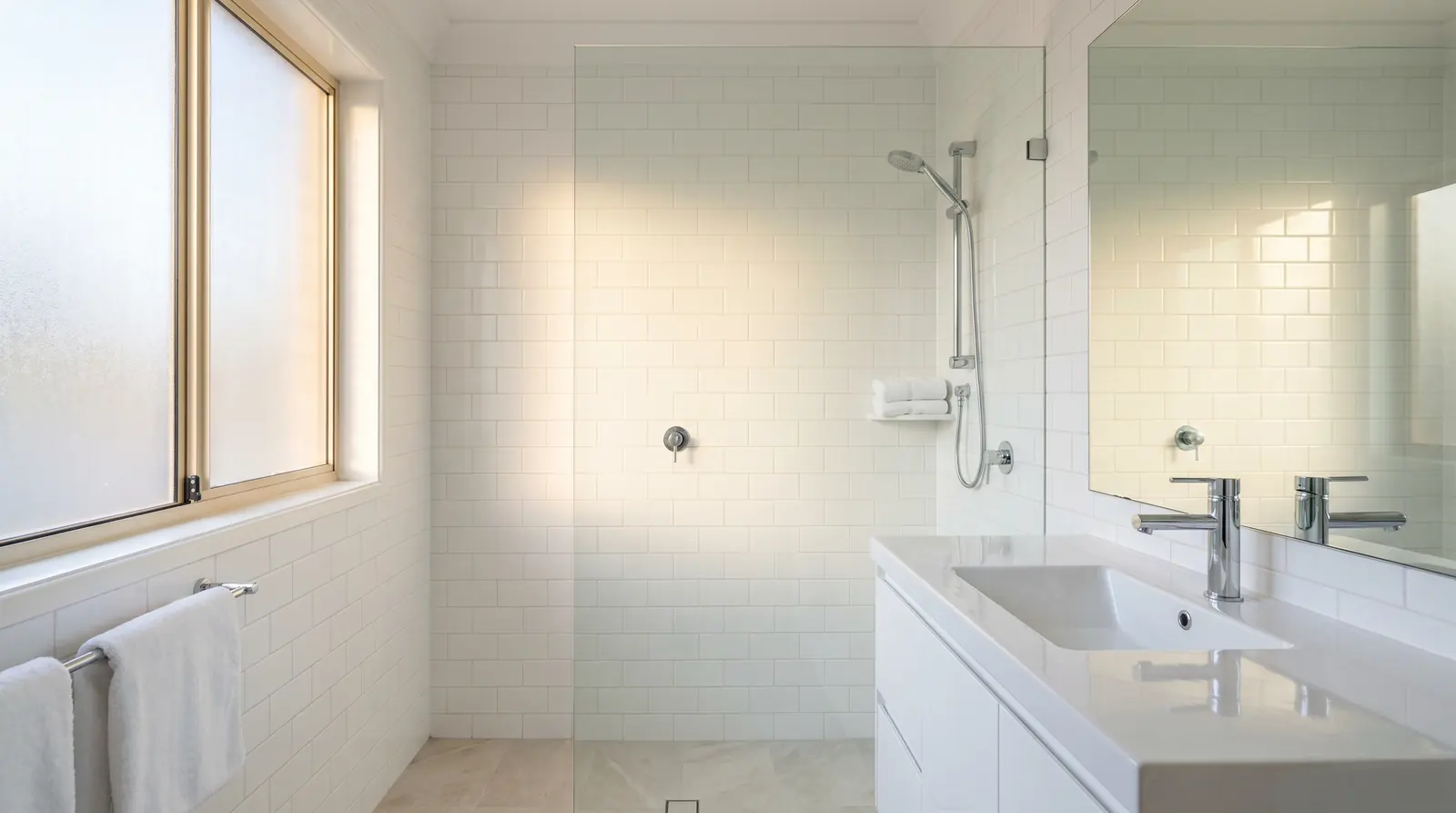 Bathroom after an end of lease clean — sparkling shower screen